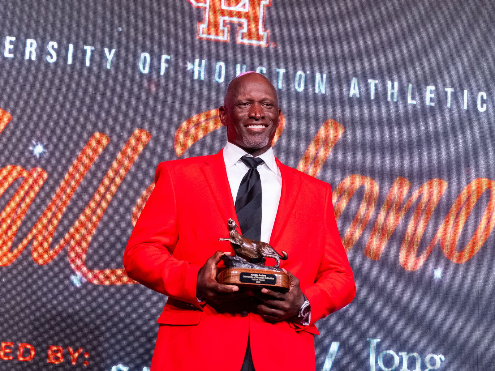 University of Houston Cougars basketball coach Kelvin Sampson was one of eight Cougars inducted into the UH Hall of Honor Friday night at the Post Oak Hotel, October 2, 2026. He was joined o stage by CBS Sports’ Jim Nantz.