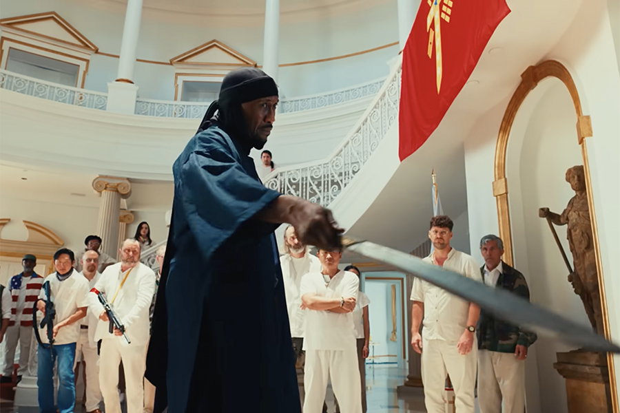Mahershala Ali with his sword in Your Mother Your Mother Your Mother.