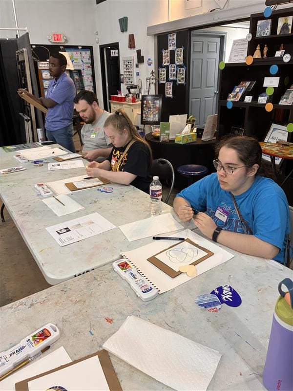 Project Beacon's clients at work in the studios with The Woodlands Arts League. (Photo courtesy of Project Beacon)